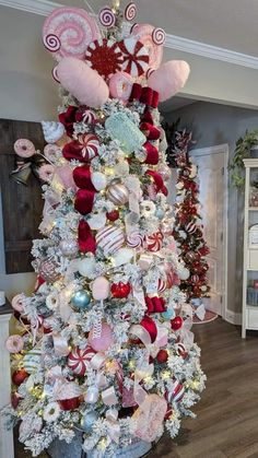 a christmas tree decorated with candy canes and candies