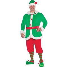 a man in a green and red christmas costume standing with his hands on his hips