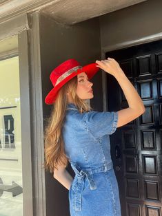 Our love of hats continues with this incredible handmade original: meet the Luxe Banded Hat in red. A hat this good needs to be worn as much as possible and with every single outfit! Hand made by artisans, incredible quality, pure suede, genuine leather trim around the crown, iconic trim, the list goes on! Will ship 12/1. The best part? It's super structured with an elastic band on the inside that will fit EVERYONE. Btw never taking this hat off. These hats are a limited edition. THE HAT:-Rancher style hat, pure suede-Stiff brim with elastic hat band on the inside-- OMG YES-Classic, standout red-Genuine leather trim and chain-- talk about luxe-Incredible quality-Holds it's shape amazingly 22.5 inches 3.5 inch brim // 4 inch crown100% suede Red Fitted Fedora With Curved Brim, Fitted Red Fedora With Curved Brim, Red Western Fedora For Kentucky Derby, Red Fedora With Flat Brim, Red Western Fedora With Short Brim, Western Style Red Fedora With Short Brim, Casual Red Wide Brim Felt Hat, Red Adjustable Fedora With Curved Brim, Red Adjustable Felt Hat With Curved Brim