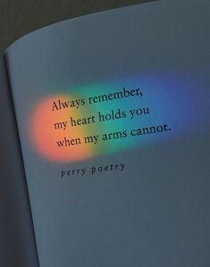 an open book with the text always remembers, my heart holds you when my arms cannot