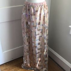 Gorgeous Pull-On Style Sequin Skirt. Quilt Pattern In Blush, Ivory, Rose Gold And Pale Silver. Fully Lined, Elastic Waist. Small Fishtail In The Back. Waist Measures Approximately 14” And Length Is Approximately 42” In The Front And Back Is Approximately 44”. Ask Questions. See Photos. Reasonable Offers Considered (Low Offers Are Not Reasonable Offers) Thanks For Looking! Metallic Long Skirt For Party, Sequin Stretch Skirt, Pink Stretch Maxi Skirt For Party, Metallic Long Skirt For Night Out, Pink Long Skirt For Night Out, Glamorous Long Skirt With Sequins, Spring Glamorous Maxi Skirt With Sequins, Glamorous Spring Maxi Skirt With Sequins, Fitted Sequined Spring Maxi Skirt