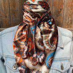 Our classic wild rag/scarf in tan and cream with a paisley pattern. It is a square and measures 35" x 35". It is sure to add a bright pop of color to any outfit. Western or Crystal slides available to accent 100% machine washable polyester, silky and soft. Outfit Western, Western Fits, Bright Pop, Cream Colored Sweater, Western Tee, Rodeo Fashion, Wild Rag, Hooded Scarf, Closet Goals