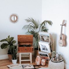 a living room filled with furniture and plants