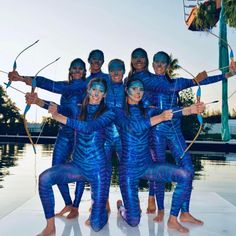 Transform into a being from Pandora with the Avatar Blue Catsuit. This full-body costume features a mesmerizing blend of dark and light blue hues reminiscent of the Na'vi people. It features a turtleneck, long sleeves, and full-length legs, with a back zipper for convenient dressing. Vibrant Color: The captivating blue tones mimic the iconic look of the Na'vi, creating an immersive experience. Versatile Design: Ideal for Halloween, cosplay, dance performances, and circus acts, this catsuit is pe Blue Stretch Costume For Cosplay, Blue Stretch Unitard For Costume Party, Avatar Dark, Avatar Costume, Custom Halloween Costumes, Avatar Blue, Catsuit Bodysuit, Bodysuit Costume, Metallic Pattern