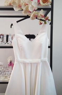 "Satin Wedding Dress With Corset Lace-up ● Classic satin corset wedding dress ● Corset accents the waist ● Corset lace-up hols the figure tightly up to the waist ● Front V-neck ● Beautiful sash with a little bow ● No elastic waist, has invisible zipper ● Flared satin skirt ● Without lining ● Fabric holds its shape well ● Standard length 153 cm (60 inches) fits as full length dress ● We can make a dress with custom length if you need Please, find your size in STANDARD SIZE GUIDE below! XS (EUR 34 Satin A-line Dress With Corset Back, White Satin Bodice With Corset Back, White Satin Corset Dress With Corset Back, Satin Corset Dress With Lined Bodice, A-line, Satin Wedding Corset With Boned Bodice, Satin Corset Wedding Dress, Ivory Satin Wedding Dress, Wedding Dress Corset, Wedding Dress With Corset