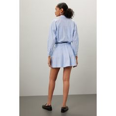 Blue cotton (Main fabric: 100% Cotton, Piping: 100% Cotton). Casual dress. Long sleeves. Collared neckline. Front button closure. 36" from shoulder to hemline. Imported. Summer Cotton Shirt Dress With Long Sleeves, Long Sleeve Cotton Shirt Dress For Summer, Cotton Long Sleeve Shirt Dress For Summer, Collared Mini Dress For Daywear In Spring, Casual Cotton Mini Dress With Collar, Chic Cotton Mini Dress For Daywear, Cotton Button-up Shirt Dress For Day Out, Long Sleeve Cotton Dress With Placket, Casual Cotton Shirt Dress For Spring