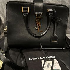 New With Tags Small Size 100% Authentic Ysl Cabas Calfskin Bag With Ysl Monogram Base Length: 11.5 In Height: 8 In Width: 6 In Drop: 3.5 In Drop: 17 In Comes With Strap Authentic Card Matching Leather Brand Card No Dust Bag Bags Ysl, Brand Card, Ysl Saint Laurent, Saint Laurent Bags, Yves Saint Laurent Bags, Monogram Bag, Yves Saint Laurent, Calf Skin, Saint Laurent