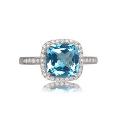 Caledon Ring - Estate Diamond Jewelry Luxury Blue Topaz Cushion Cut Ring, Cushion Cut Topaz Ring With Halo Setting, Cushion Cut White Gold Topaz Ring With Halo Setting, White Gold Topaz Ring With Halo Setting, Cushion Cut, Cushion Cut Blue Topaz Ring With Halo Setting, Blue Topaz Cushion Cut Ring With Halo Setting, Estate Diamond Jewelry, Vintage Cocktail Ring, Perfect Engagement Ring