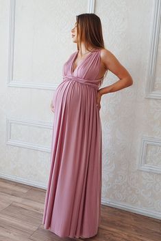 2 piece Set includes: Multiway gown and matching bandeau top Elevate your maternity fashion game with a dress that adapts to your mood and the occasion. The fabric can be artfully twisted, wrapped, and tied in multiple ways, allowing you to effortlessly switch between styles. Transform it into a chic halter neck for a breezy summer afternoon, flaunt an elegant off-shoulder look for date night, or opt for a sophisticated one-shoulder style for that special event. This styles features a matching b Elegant Flowy Maternity Gown, Flowy Maternity Gown, Flowy Floor-length Maxi Dress For Maternity, Summer Maternity Maxi Dress For Bridesmaid, Summer Maternity Bridesmaid Dress In Maxi Length, Summer Bridesmaid Maternity Maxi Dress, Summer Bridesmaid Maternity Dress In Maxi Length, Maternity Floor-length Gown, Floor-length Maternity Gown