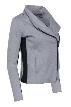 Get the classic downtown, cool moto jacket style with the coziness of a sweatshirt with this gray piece from Vince! Zip this relaxed beauty up over white tees, turtlenecks, or a slip dress to instantly elevate your entire closet. Size XS 100% Cotton Front zipper closure Front pockets Wide collar Black elasticized paneling on sleeve Waist 28" Sleeve 23" Shoulder to hem 21.5" Gray Long Sleeve Track Jacket With Zipper, Gray Sporty Sweatshirt With Zipper Closure, Gray Sweater Zipper, Gray Zipper Closure Hoodie Outerwear, Gray Functional Moisture-wicking Track Jacket, Moto Jacket Style, Closet Size, French Girl Chic, Moto Style