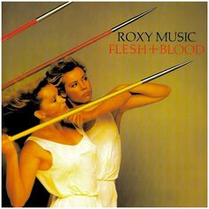 two women are holding up swords in front of their heads and the words roxy music flesh - blood