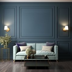 a living room with blue walls and wood flooring is pictured in this image, there are two lamps on either side of the couch