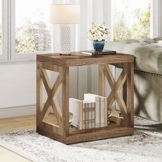 a wooden end table with books on it