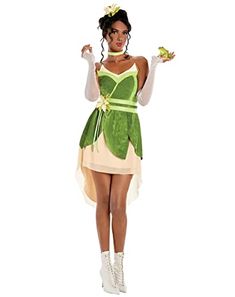 a woman in a green and white costume holding a piece of broccoli with both hands