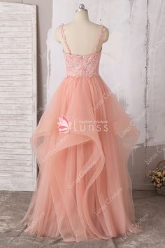 a - line spaghetti straps floor length tulle prom dress with beading and ruffled skirt