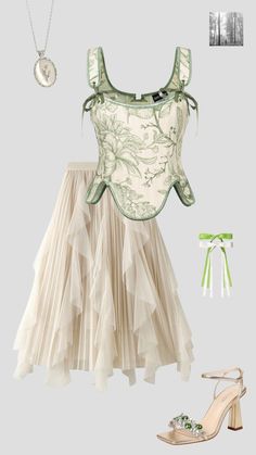 The flowy skirt and green corset top gives such Folklore vibes and is perfect for The Eras Tour concert! One click to amazon!  #ad #folklore #greencorset #corsettop #flowyskirt #creamskirt #greenhairbow #flowernecklace Folklore Outfit Concert, Quick Eras Tour Outfits, Eras Tour Outfit Amazon, Eras Tour Ivy Outfit, Taylor Swift Folklore Concert Outfit, Folklore Eras Tour Outfits Ideas, Eras Tour Tops, Eras Tour Outfit Folklore