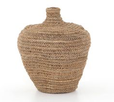 a woven vase is shown on a white background with clippings to the bottom