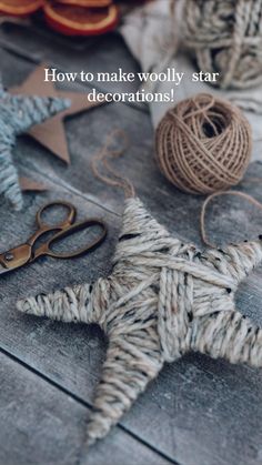 there is a star decoration on the table with twine and scissors next to it