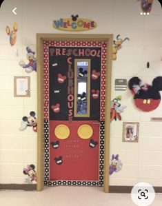 a door decorated to look like mickey mouse's house with the words preschool on it