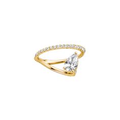 a yellow gold ring with a pear shaped diamond set in the center and side stones