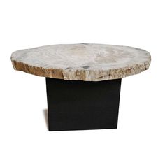 a wooden table with black base on white background