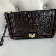 Nwot 12 By 7 Inches. Braided Design Clutch. Embossed, Crocodile Texture Material. Gold Hardware. Detachable Strap. Multiple Compartments. Plastic Cover On Hardware. Very High Quality Design. Dust Cloth And Official Card Inside. Luxury Brown Clutch With Detachable Strap, Luxury Brown Textured Leather Clutch, Designer Brown Shoulder Bag With Crocodile Pattern, Designer Brown Crocodile Pattern Shoulder Bag, Luxury Brown Crossbody Clutch, Luxury Brown Clutch With Gold-tone Hardware, Crocodile Texture, Texture Material, Pink Polka Dot Dress