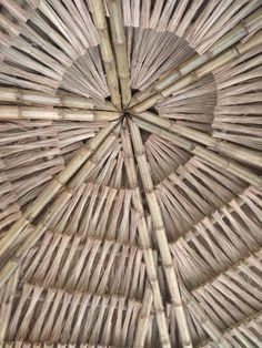 an umbrella made out of bamboo sticks