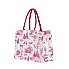 a red and white tote bag with christmas images on the front, two handles