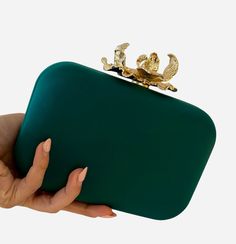 length: 7.2 inches height: 4.7 inches width: 2 inches This beautiful green evening purse is a work of art. It comes with a detachable gold chain so you can wear it as a shoulder bag or hold it as a clutch. Big enough to fit in your iphone evening bag evening purse evening clutch green bag green purse handmade bag handmade clutch Luxury Green Rectangular Clutch, Luxury Green Clutch Evening Bag, Green Evening Bags With Chain Strap, Green Clutch Bag For Party, Green Clutch For Party, Elegant Green Bags With Chain Strap, Luxury Green Evening Bag, Luxury Green Rectangular Evening Bag, Luxury Green Evening Bag For Gift