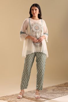 Off-white kurta with sequin, thread, french knots, bead embroidery in geometric applique pattern. Paired with inner and green floral print pant. - Aza Fashions White Sequin Sets For Eid, White Sequined Sets For Summer, White Sequin Sets For Summer, White Sequined Summer Sets, White Sequin Summer Sets, Geometric Applique, Net Embroidery, Print Pant, White Kurta