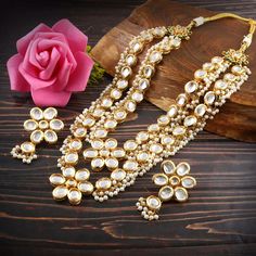 This is a stunning handmade necklace perfect for high end Jewelry Collector, a keeper in Traditional Vintage Indian/Pakistani Bridal jewelry and a Luxury Gift for your Daughter, Sister or Wife on Wedding or Anniversary. Perfect for any type of occasions, weddings And celebrations and a beautiful & memorable gift for weddings and special occasions. -Item Code- L -Polki Diamond Necklace Set with Earrings. -Designer Meenakari Pearl Cluster Bridal Necklace Set. -Gold Plated Set with Kundan Stones which shine like Polki Diamonds. -Metal: Gold plated brass -Earrings are 55x33mm long approx -Necklace length is 9" long approx excluding adjustable dori cord -Push Back Earrings -Quantity:- One Necklace Set Please see more different designs here:- https://www.etsy.com/in-en/shop/LUCKYJEWELSART?ref=se Luxury Designer Meenakari Jewelry, Polki Diamond Necklace, Pearl Cluster Necklace, Pakistani Bridal Jewelry, Bridal Necklace Set, Earrings Trendy, Diamond Necklace Set, Kundan Necklace, Pearl Cluster