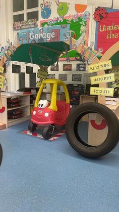 children's play area with toys and books