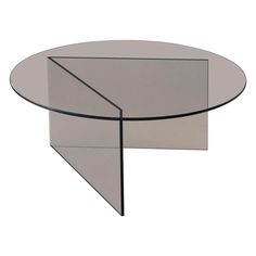 a glass and metal table with an upside down design