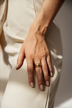 Make a bold statement with the Persephone - Three Layered Ring. Its unique, modern design features three layers of water and tarnish-resistant metal providing enduring beauty. Perfect for any occasion, it's sure to become a timeless favorite. MATERIAL: 18k PVD Gold plated, Stainless steel SIZES: 6, 7, 8 Water resistant, tarnish resistant, hypoallergenic, & nickel/lead free. Statement Rings Unique, Layered Rings, Gold Statement Ring, Three Layer, How To Apply Makeup, Statement Ring, Unique Rings, Jewelry Care, Design Features