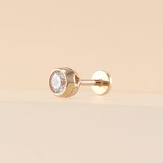 "14K 3.5mm Solid Gold CZ Stud Labret, Cartilage, Tragus, Helix, Conch, Lobe, 14K Solid Gold Piercing Earring, Minimalist Earring, Simple Stud, Geometric Earring, Dainty Earring Please note that this earring is made to order. S P E C S ♦ All of our jewelry is handmade in our studio in Seoul, Korea. ♦ 14K Gold (available in white, yellow, or rose) ♦ Pendant Size 4.7(W) x 4.7(L) x 4(H) mm ♦ Stone : Cubic Zirconia 3.5mm ♦ Post Thickness: 1mm / 18 Gauge ♦ Total Length of Post : 8mm (Shown Part after Minimalist Internally Threaded Cartilage Earrings For Anniversary, Minimalist Diamond White Piercings As Gift, 14k Gold Piercings With Prong Setting As A Gift, Minimalist Cartilage Earrings With Prong Setting As Gift, Internally Threaded White Gold Round Cartilage Earrings, Internally Threaded White Gold Cartilage Earrings, Minimalist Internally Threaded Round Piercings, Everyday Internally Threaded Yellow Gold Cartilage Earrings, White Gold Internally Threaded Cartilage Earrings As A Gift