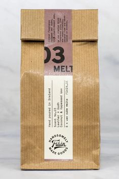 a brown paper bag with a label on it