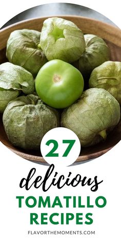 some green tomatoes in a wooden bowl with the words 27 delicious tomato and pesto recipes