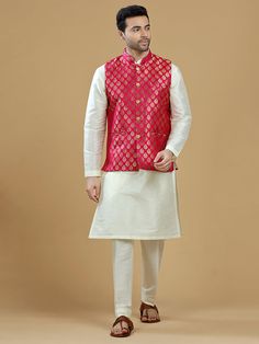 A gold zari brocade vest to pair with any kurta with statement button closures at the front. Occasion: Style this vest with pajama pants and a kurta for a welcome dinner or sangeet night, or style it with a any dress shirt and trousers for a sleek Indian wedding reception look! WASH CARE INSTRUCTIONS - Please Dry clean only. Slight color variation is possible due to digital photography. **Kurta & Pajama not included Festive Pink Nehru Jacket Straight Kurta, Pink Nehru Jacket For Festive Occasions, Pink Nehru Jacket Straight Kurta For Diwali, Pink Nehru Jacket For Diwali, Festive Pink Nehru Jacket With Dabka, Bollywood Style Pink Nehru Jacket For Festive Occasions, Bollywood Style Pink Nehru Jacket For Eid, Pink Dabka Nehru Jacket For Festive Occasions, Traditional Pink Nehru Jacket For Festive Occasions