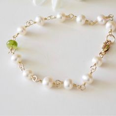 I Created This Bracelet With Cultured Freshwater Pearls And A Peridot Gemstone. The Pearls Are Potato Shape With Beautiful Luster And Smooth Nacre. The Peridot Is A Faceted Gemstone To Give You That Sparkle When The Light Reflects Off Of It. It Is A Beautiful Lime Green. It Is Finished With A Lobster Claw Style Clasp. Excellent Bracelet For Everyday Wear. Great Gift For All Occasions. Birthdays, Weddings, Graduations, Holiday Jewelry, Mothers Day, Grandmas, Sisters, Best Friends! The Care For Al Sisters Best Friends, Princess Gifts, Peridot Jewelry, Jewelry Accessories Ideas, August Birthstone, Peridot Gemstone, June Birthstone, Holiday Jewelry, Freshwater Cultured Pearls