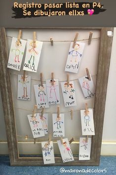 a bulletin board with clothes pins attached to it and some writing on the pegs