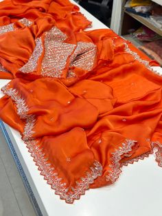 Orange Hand Embroidered Satin Organza Saree.  Heavy Blouse. Wedding Georgette Blouse With Embroidered Border, Semi-stitched Georgette Blouse With Embroidered Border, Dola Silk Blouse With Intricate Embroidery, Elegant Blouse With Dupatta For Celebrations, Intricate Embroidery Dola Silk Blouse Piece, Elegant Saree With Intricate Embroidery For Celebration, Orange Embroidered Silk Sharara, Elegant Silk Blouse Piece With Dabka Work, Festive Georgette Blouse With Embroidered Border