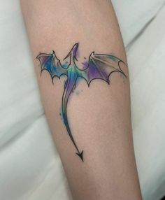 a bat tattoo on the arm and leg