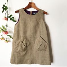 Esquire Junior Is S Very High-End Brand. The Brand Is Mostly Handmade By Taylors In Shanghai. Linen Pinafore Dress. Beautiful Purple Top Half Of Dress Lining . Back Zipper .Tweed Linen Some Into Fabric . Beautiful Slanted Puffy Pleated Pockets With Decorative Tucks . Beautifully And Well Finished Inside And Out High Quality Very High Quality Small --- Fits Size 4 /5 Medium -- Fits Size 6/7 Large -- Fits Size 8/9 Xlarge -- Fits 10/11 Linen Pinafore Dress, Linen Pinafore, Purple Top, Pinafore Dress, Boutique Dresses, Kids' Dresses, Sleeveless Top, Sleeveless Dress, Kids Fashion