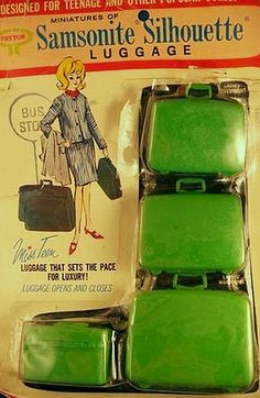 three pieces of luggage in green packaging on the package is an advertisement for samsonite silhouette luggage