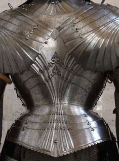 the back of a suit of armor on display