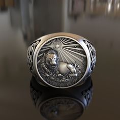 Showcase your astrological sign with our Handcrafted 925 Sterling Silver Leo Zodiac Ring. This ring, meticulously handcrafted, displays the Leo Zodiac symbol, infusing a unique personal touch into your jewelry collection. Made from premium quality 925 Sterling Silver, it's designed to stand the test of time and maintain its shine even with daily use. This unisex ring makes an excellent gift for any Leo, whether it's their birthday or a special occasion. Its timeless design complements a range of Silver Zodiac Sign Ring, Silver Zodiac Sign Rings For Gift, Silver Zodiac Sign Rings As Gift, Leo Zodiac Symbol, Leo Ring, Zodiac Rings, Viking Ring, Masonic Ring, Retro Ring