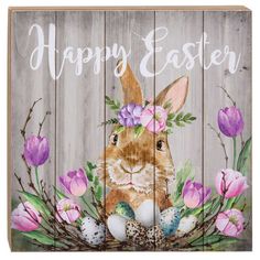 a wooden sign that says happy easter with an image of a bunny surrounded by flowers and eggs