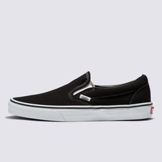 The Slip-On that’s been Setting Trends Since 1979Vans #98 was introduced in 1979, but this Classic Slip-On has come a long way. Black Slip-On sneakers don't come more stylish and spectacular than this. The low-profile canvas uppers, supportive padded collars, and rubber waffle outsoles take care of the comfort. All that remains is to slide in and hit the road. Vans beloved Slip-On sneakers provide convenience and comfort in equal measure. A Classic Slip-On sneaker for the modern world? Look no f Black Slip On Vans, Slip On Vans, Black Slip On Sneakers, Vans Store, Timeless Shoes, Black Slip On Shoes, Handbag Essentials, Vans White, Black Vans