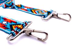 "These 48\" long multi-purpose beaded straps are a stunner! It's vibrant colors and brilliant glass beads make it unique and make it POP. Handmade with impeccable precision and detail, the straps can be re-purposed as a crossbody/purse strap, luggage strap, guitar bag strap, and even as a crossbody for your camera bag. With strong Native influences, these multi-functional straps are designed to make you feel bold and empowered! Length: 48\" Width: 1.25\" Handmade in Guatemala *Please note that a Beaded Crossbody Shoulder Bag For Travel, Beaded Bag Strap, Adjustable Beaded Rectangular Bags, Beaded Everyday Bag, Travel Multicolor Beaded Shoulder Bag, Adjustable Rectangular Beaded Bags, Bohemian Multicolor Adjustable Bag Strap, Beaded Gameday Purse Strap, Camera Beads Strap