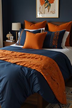 an orange and blue bed in a bedroom